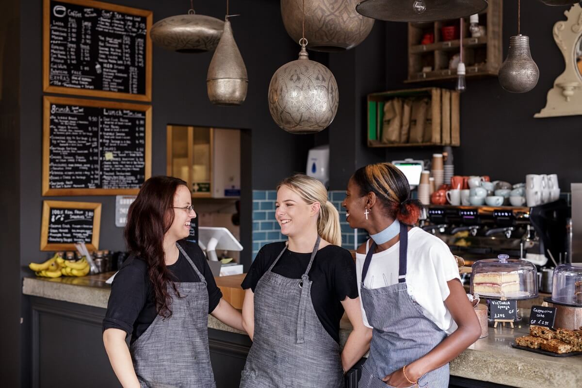 esquires organic coffee shop staff in store