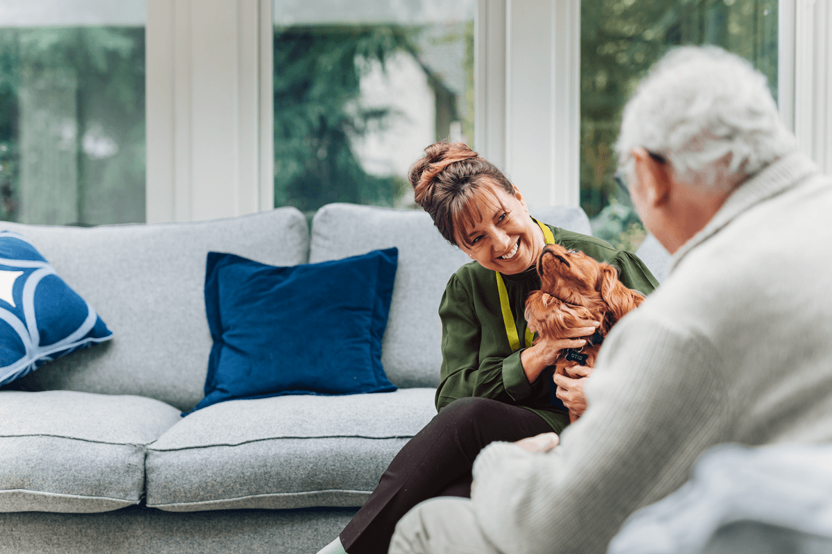 Home Instead caregiver with client