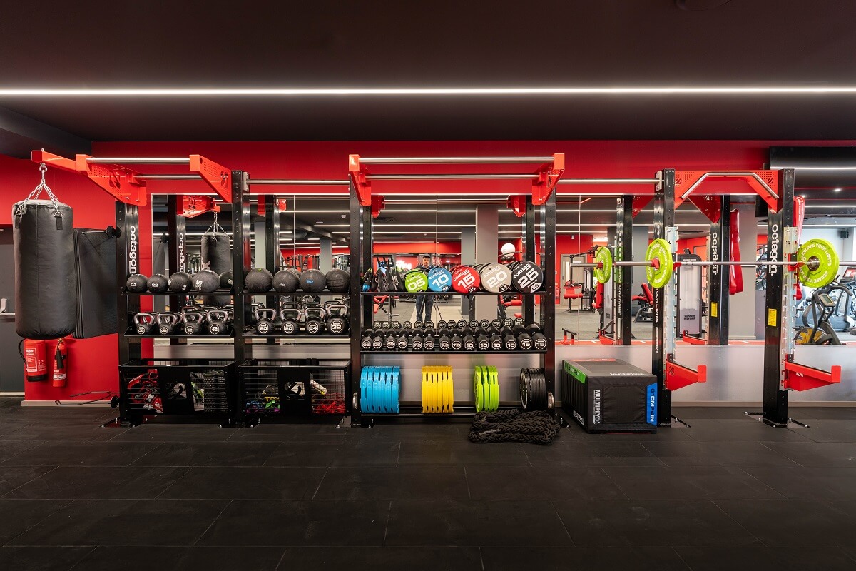 Man on treadmill inside a snap fitness gym