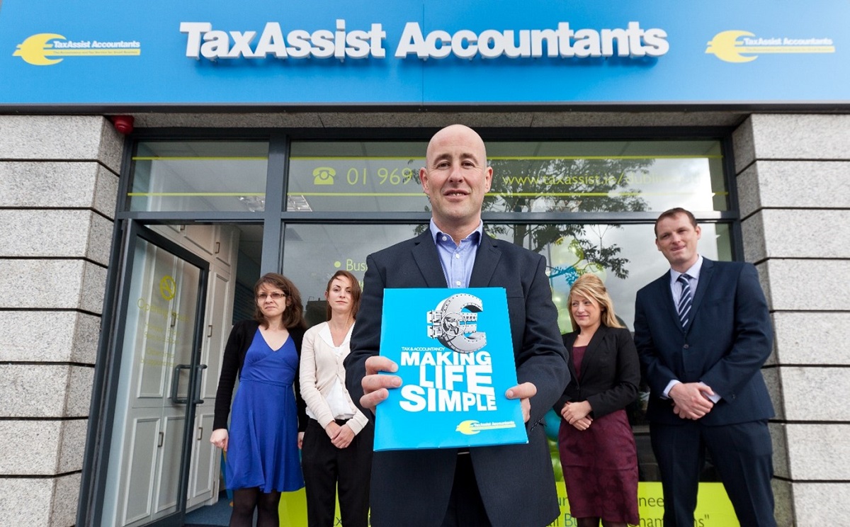 TaxAssist Accountants franchisee infront of their shop