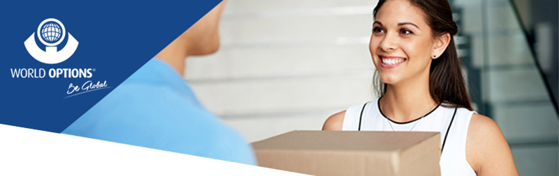 world options franchise owner giving parcel to delivery man