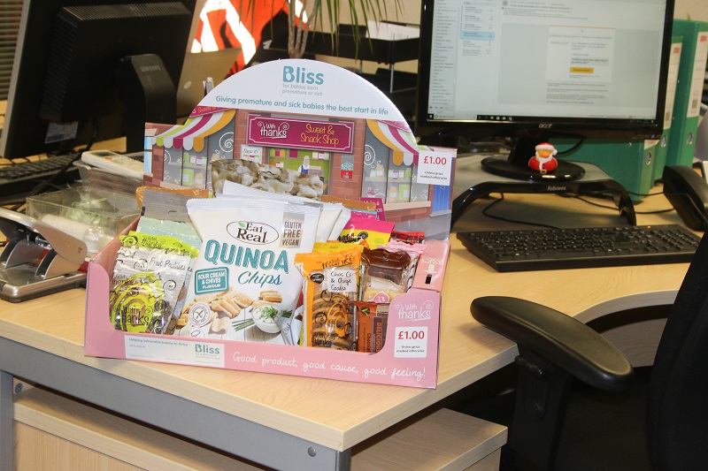charisnack boxes with products on a desk
