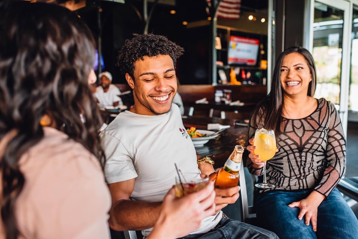 Customers relaxing at Walk On's Bar